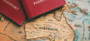 Two passports on map. Travel to Australia 870x400 1